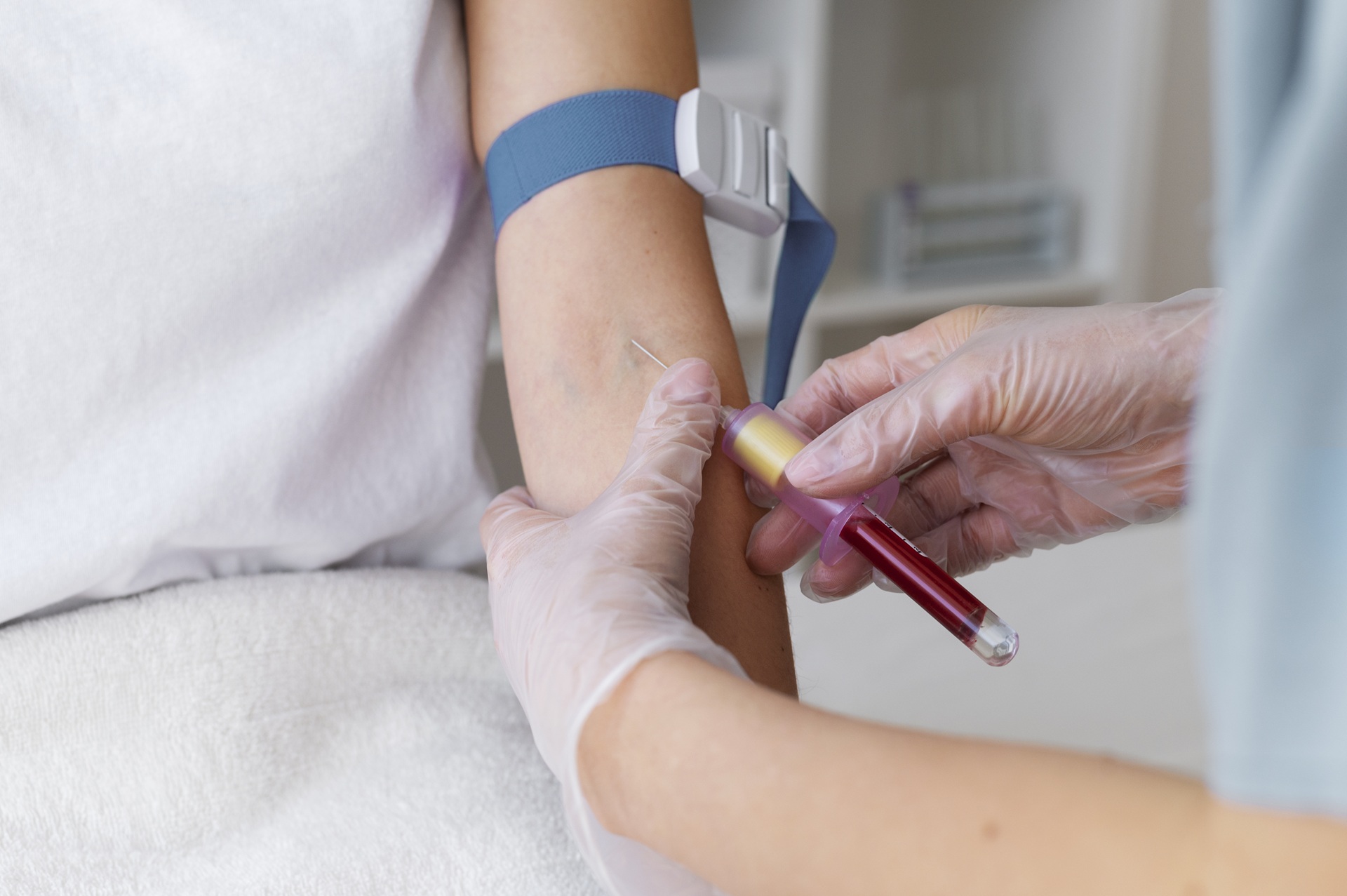 Thanyapura-Sports-Health-Resort-high-angle-health-professional-drawing-blood