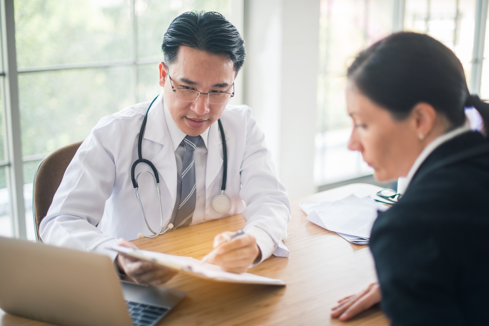 The doctor giving a consultation to a patien